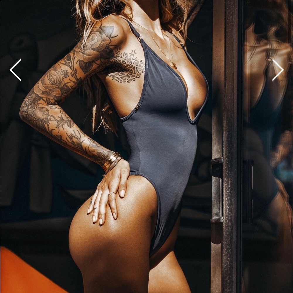 Flattering one piece swimsuit. Beautiful color.